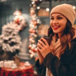 Woman in winter hat and scarf has glowing skin after a chemical peel during the cold months.