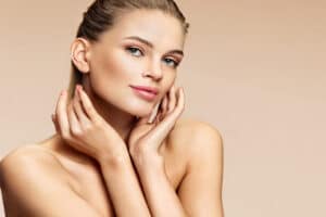 Woman with fresh skin after cosmetic light-based treatments in Sarasota